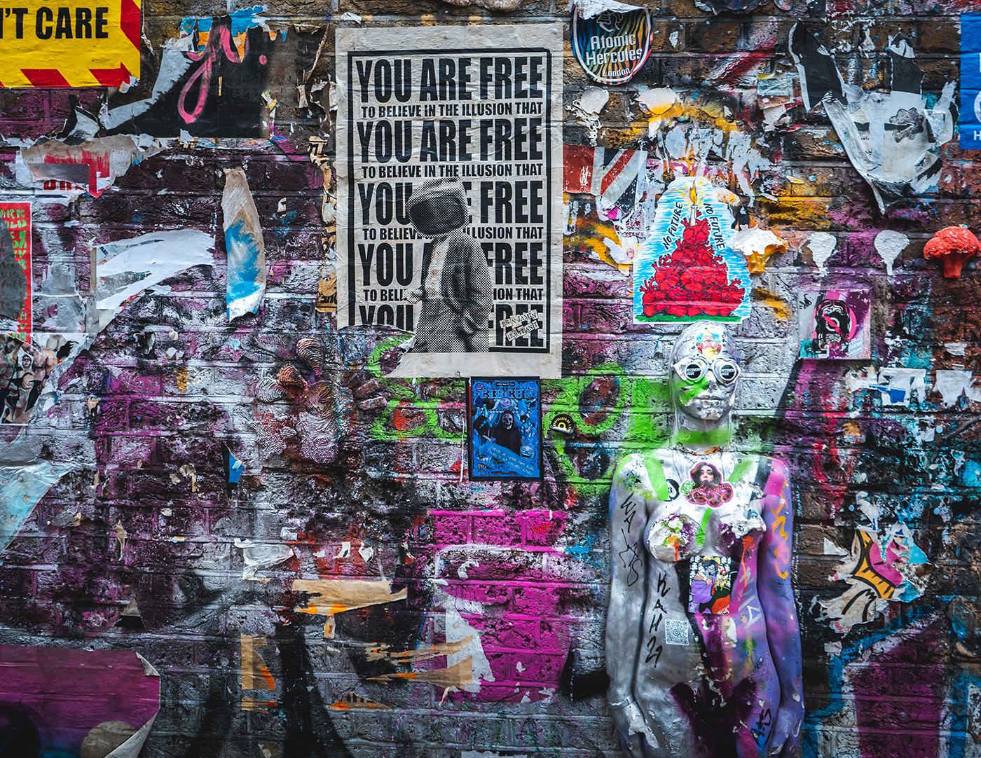Image of a wall covered in graffiti